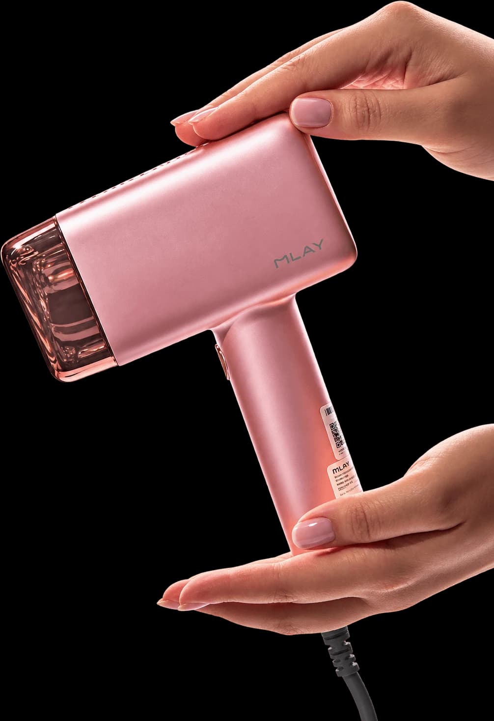 An MLAY home-use laser hair-removal device, held in two hands.